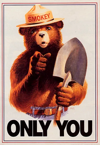 Smokey Bear pointing with a shovel in hand saying Only You
